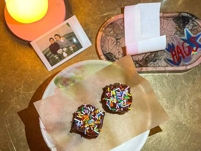 Our check came with a side of homemade cosmic brownies and a Polaroid photo.