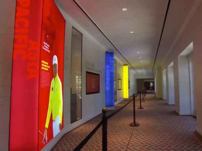 A decorated hallway guides patrons into the store.