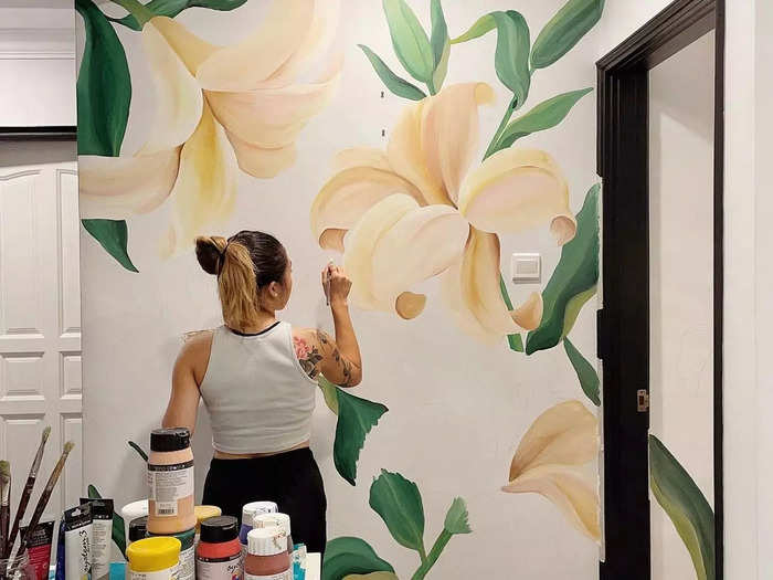 And it all started with her own home: The first time she ever painted a mural was in her childhood bedroom.