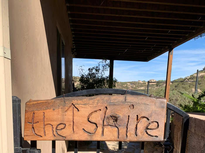 Hobbit house guests enter through a side gate charmingly labeled "The Shire."