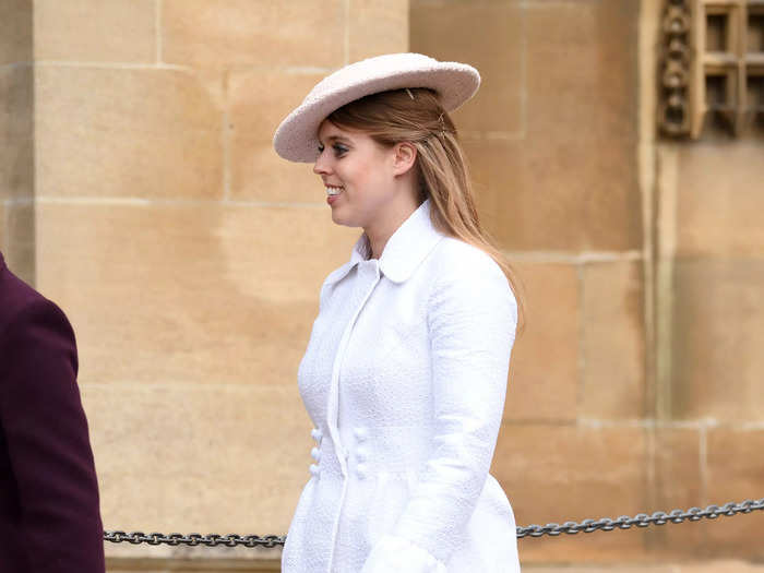 In 2018, the Princess of York stunned in a white coat, matching hat, and nude heels.