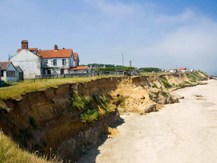 An increase in storms that are linked to climate change may be exacerbating the erosion of the sandy shoreline. Storm surges cause raised water levels that batter the shore, causing more erosion.