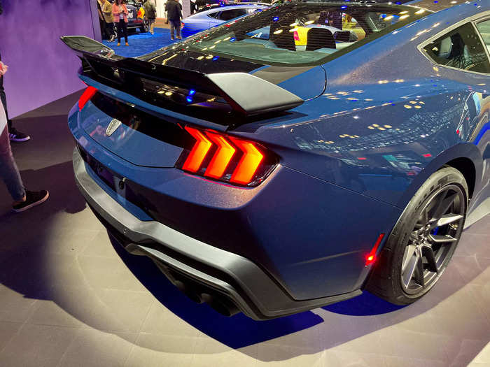 The Dark Horse gets carbon-fiber wheels, a dramatic spoiler, and a 5.0-liter V8 engine targeting 500 horsepower.