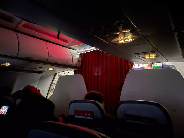 Shortly after the first round of in-flight service, around 9:30 p.m. Boston time, the staff dimmed the lights. Although it was quiet, I can never sleep on planes, so I just tried to relax.