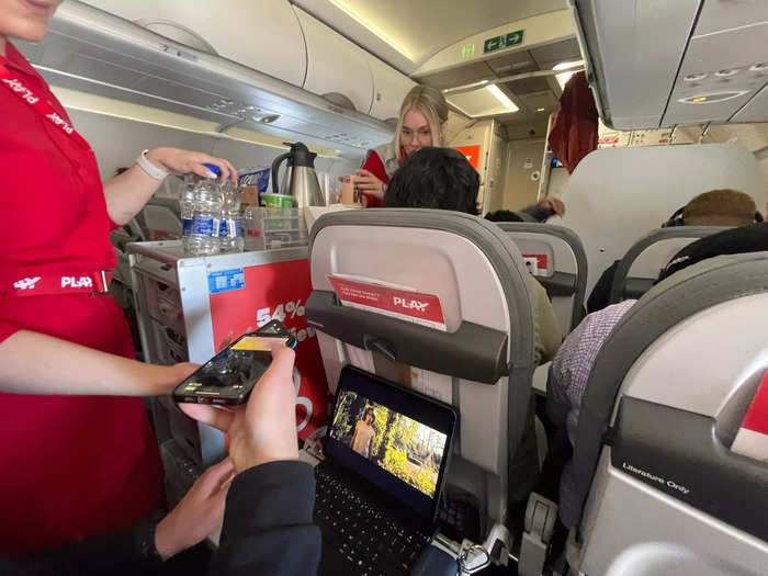 A flight attendant announced over the intercom that the airline only accepts contactless debit or credit cards for payment for food and drink.