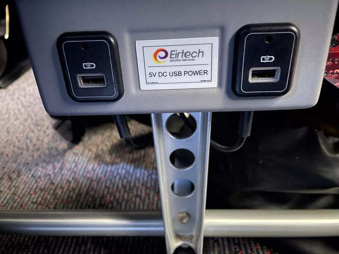 I saw USB ports beneath the seats, which I could use to charge my phone during the flight.