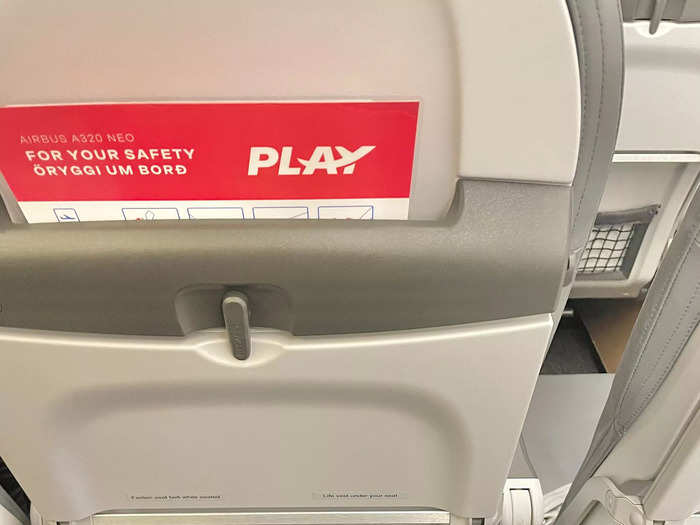 I sat in a middle, extra-legroom seat in the plane