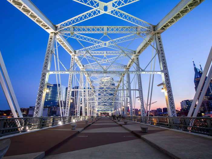 Rather than waiting in long lines to take photos in front of a Nashville mural, go to the pedestrian bridge and snap pictures with the entire skyline.