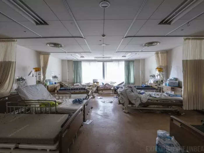 Here you can see remnants of the chaotic rush to evacuate. Patients left their unmade beds with no intention of returning. They left personal items and medical equipment behind.