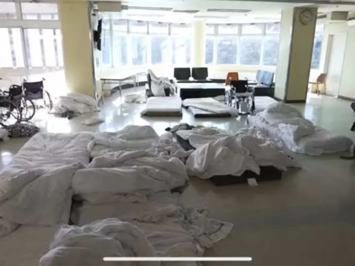 Twelve years later, mattresses remain on the floor showing where people found refuge in the hours and days after the natural disaster.