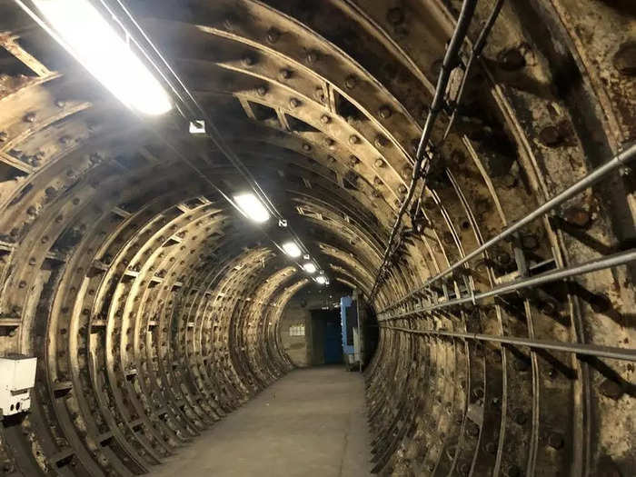 We entered an empty, grungy tunnel with curved walls that loomed over us. The guides explained that the line had been difficult to keep cool and passengers in the early 20th century would often complain about the smell.