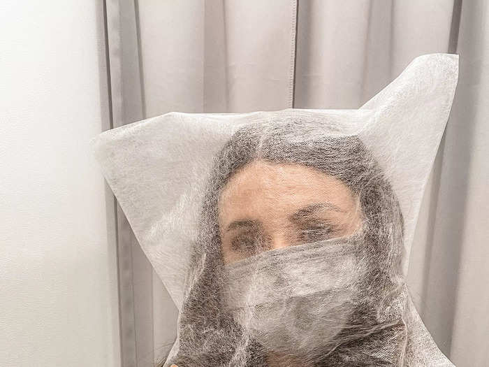 Some stores provide mesh head coverings for shoppers to wear while trying on clothes.