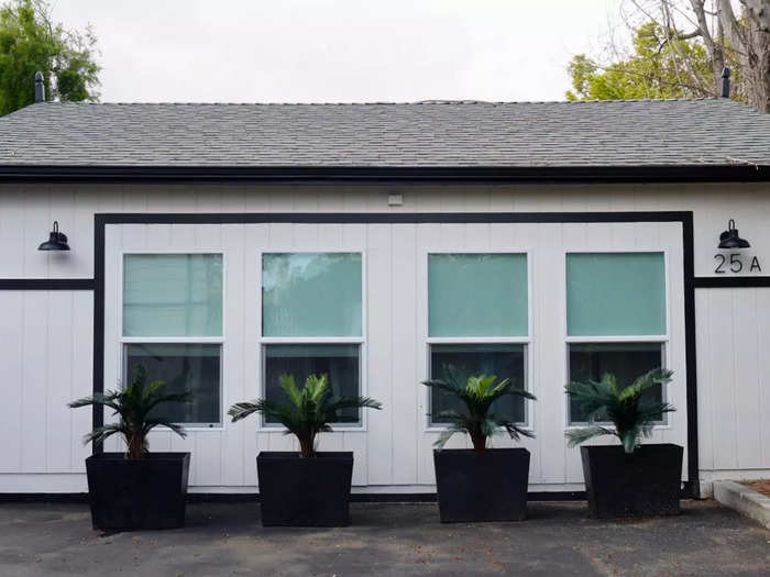 The "after" view shows how a wall with windows replaced the garage door.