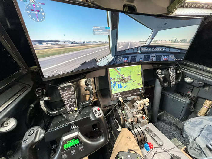 A flight simulator located in the cockpit is a strong draw for plane-lovers