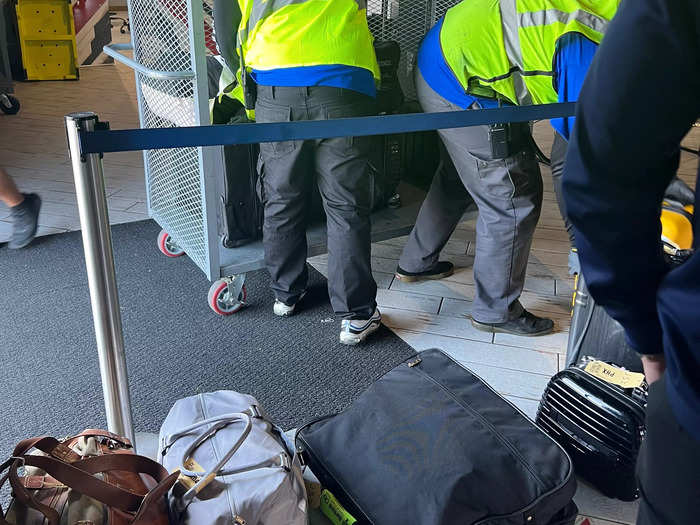 Shortly after, the ground crew unloaded our luggage right inside the arrivals lobby. This was much more convenient than waiting at bag claim.