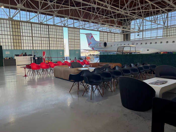 Once I was checked in, I realized the terminal was actually a hangar with a large waiting area. The space has chairs and couches available for JSX passengers.