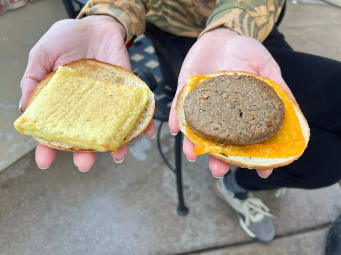 Between a thin toasted "Everything Bagel" sits a Beyond Breakfast Sausage, JUST Egg Folded — which is made from mung beans, but you