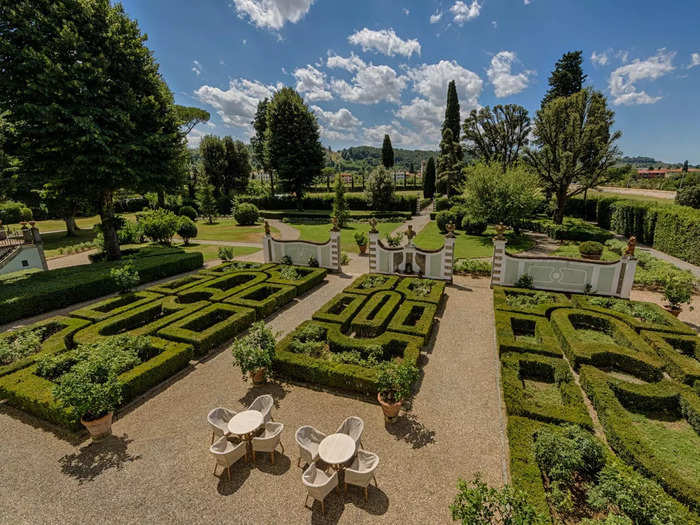 Hotel Villa Olmi Firenze is an 18th-century villa with frescos, a pool, and castle-like grounds just two miles from Florence, Italy, starting at $137 per night.