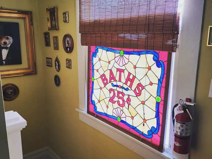 Heim found this vintage bath sign at a local antique store.