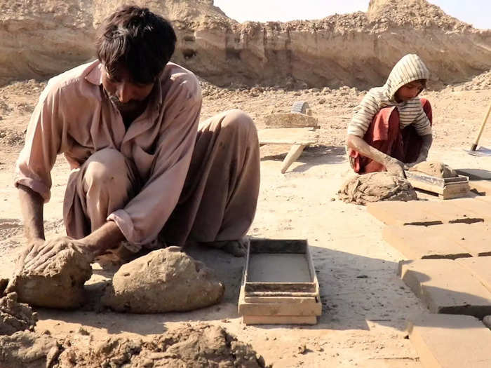 Poonjo Meghwar, a brick kiln worker, believes he still owes about $560 dollars from a loan he borrowed years ago to pay hospital bills.