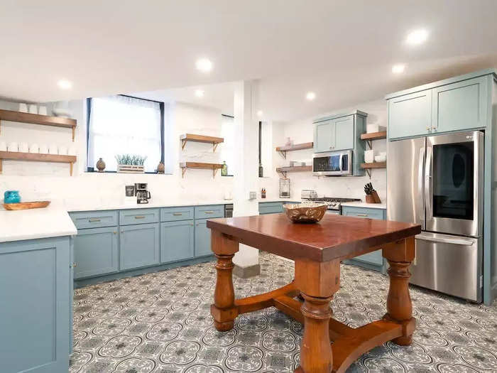 What was previously a tiny kitchen has been converted into what Rooney called a "gourmet" one.