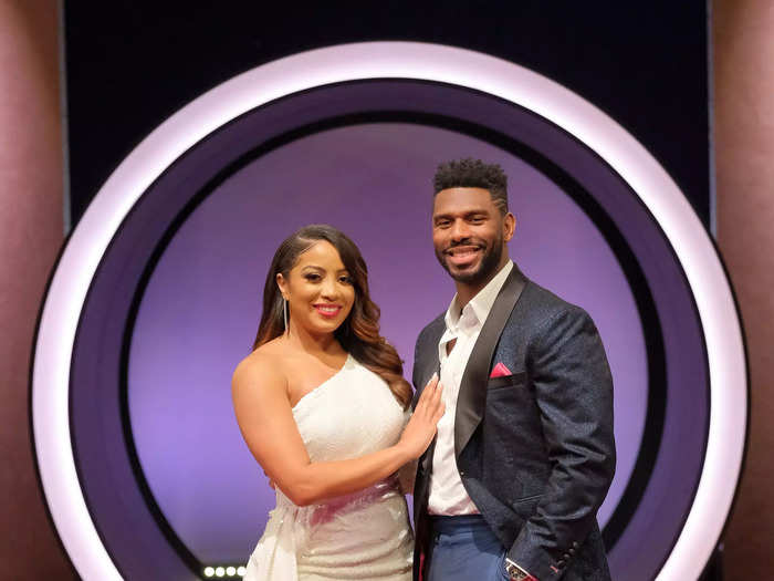 "Love Is Blind" season four star Tiffany Pennywell wore a white dress to the reunion, while her husband Brett Brown wore a custom suit.