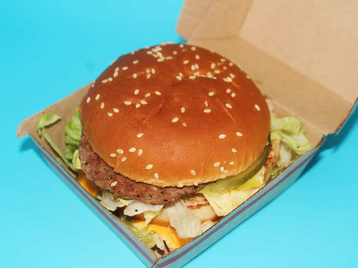 A Big Mac comes with two 1.6-ounce beef patties, pickles, shredded lettuce, chopped onions, a slice of American cheese, and layers of Big Mac sauce on a sesame-seed bun.