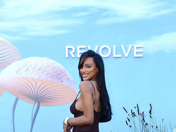 Jasmine Tookes arrived at Revolve Fest in a sheer dress.