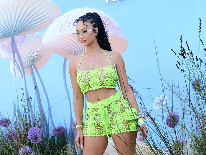 Draya Michele popped in a lime-green set at Revolve Fest.