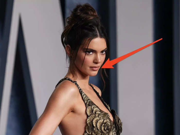 Kendall Jenner drunkenly got "Meow" tattooed on the inside of her bottom lip.