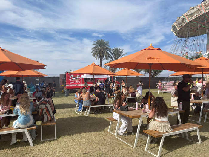 Another area had food trucks, which were surrounded by picnic tables with umbrellas so guests could comfortably sit and eat their free food.