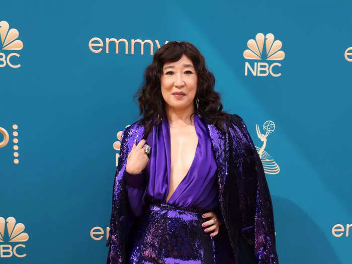 Sandra Oh demonstrated another way to wear separates to formal events with a purple Rodarte jumpsuit and blazer at the 2022 Emmys.