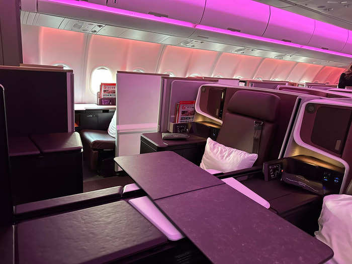 The aircraft has business class, premium economy, and economy cabins. I started my tour at the front of the plane in their business-class product known as Upper Class, and was impressed by the seats right away.