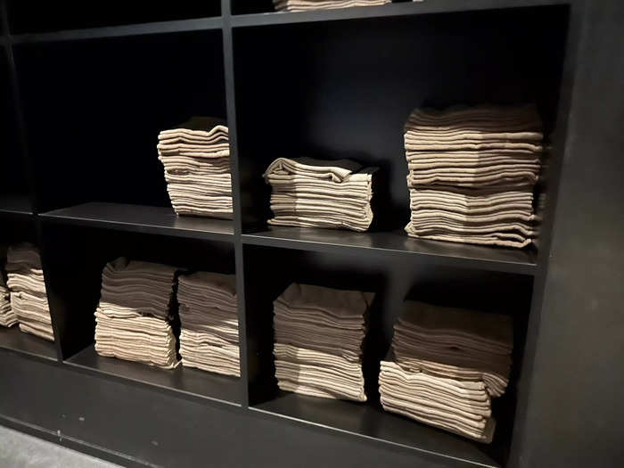 When I left the room, I was greeted by a bench and shelves filled with clean towels to dry our legs off.