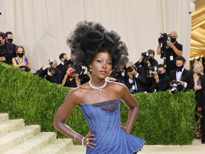 In this dramatic denim gown, Lupita Nyong