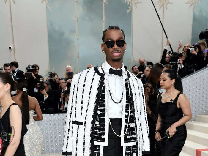 NBA player Shai Gilgeous-Alexander showed up in a tweed look designed by Thom Browne.