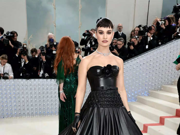 Lily James wore a black leather gown that resembled a Chanel handbag.