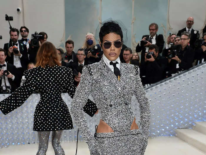 Teyana Taylor put a feminine twist on classic menswear designs in a dress by Thom Browne.