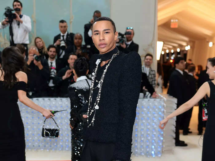 Olivier Rousteing wore an all-black ensemble and beaded necklaces by Chanel.