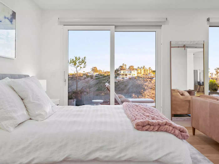 On the other side of the house, a Jack-and-Jill bathroom connects the two other bedrooms.