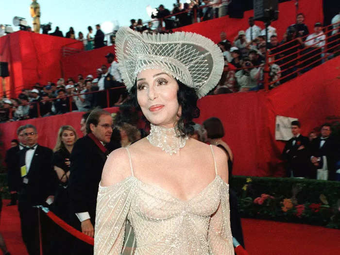 In 1998, Cher wore a sparkly, sheer, off-the-shoulder dress to the Oscars.